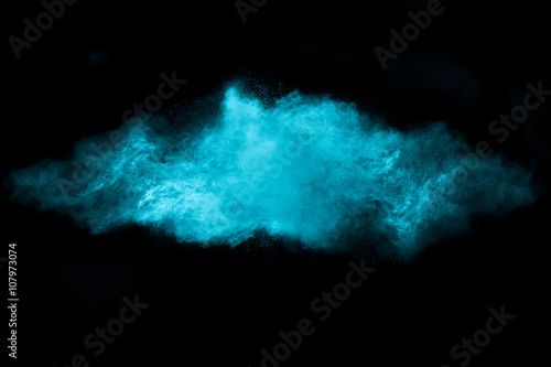 Blue Dust Particle Explosion Isolated on Black