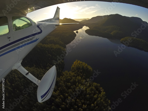 Over the lake aerial during sunset 