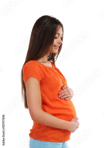 Beautiful pregnant woman is...