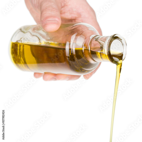 Oil pouring from a bottle.