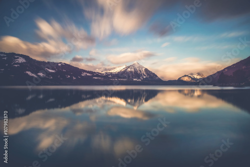 Morning glory - Beautiful sunrise ober the lake thun in Switzerland photo