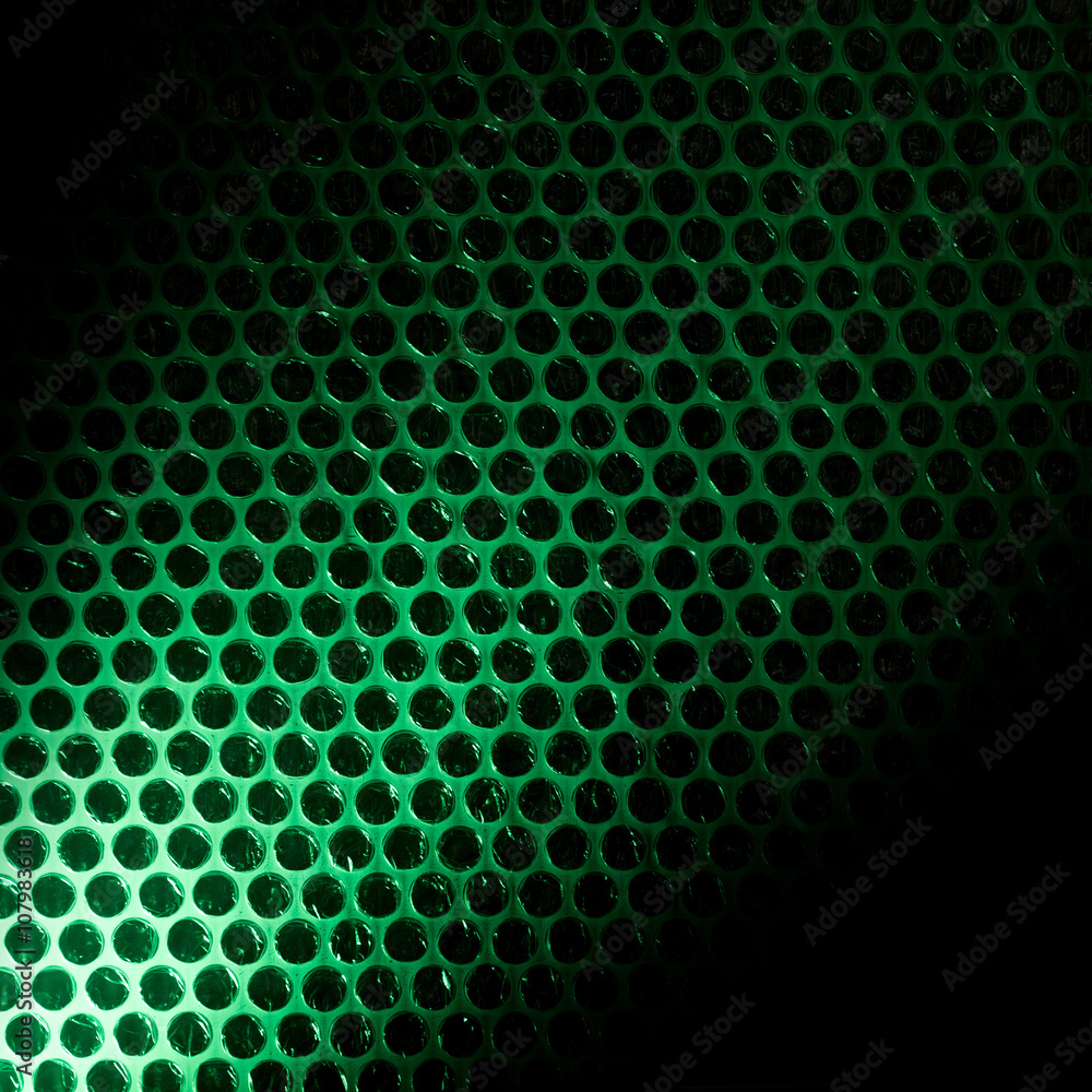 Bubble wrap lit by green light Bubble wrap lit by green light
