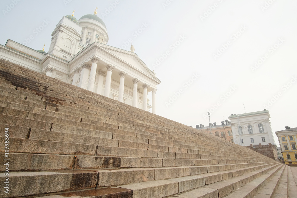 HELSINKI, FINLAND - april, 4, 2016: St. Nicholas Church and a monument of Alexander II on the Senatorial area in Helsinki, Finland.