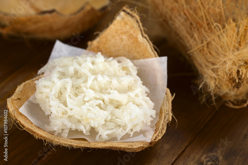 Peruvian cocada, a traditional coconut dessert sold usually on the streets, made of grated coconut and granulated white sugar (Selective Focus, Focus one third ino the cocada) photo