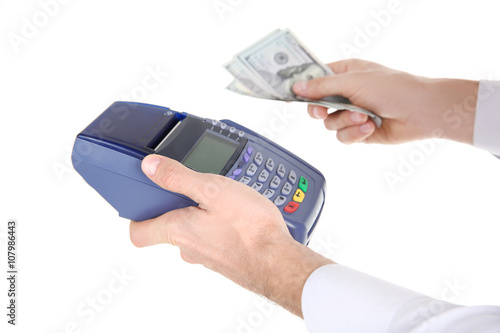 Businessman with payment terminal and cash, isolated on white
