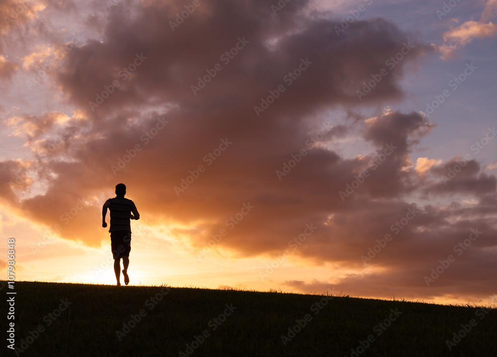 Male running in a beautiful setting.