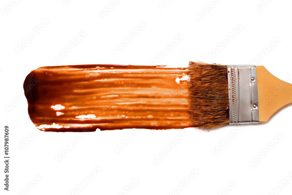 paint brush and dab of chocolate sauce. chocolate sauce. texture. sample  and brush isolated on white background Stock Photo