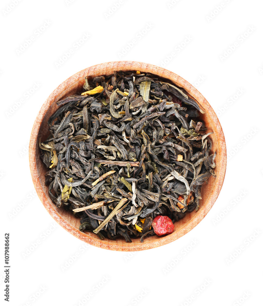 Dry tea in saucer isolated on white Dry tea in saucer isolated on white