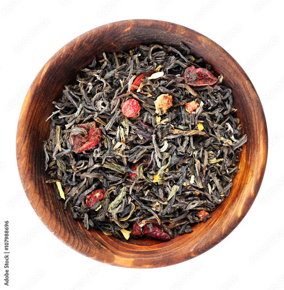 Dry tea in saucer isolated on white Dry tea in saucer isolated on white