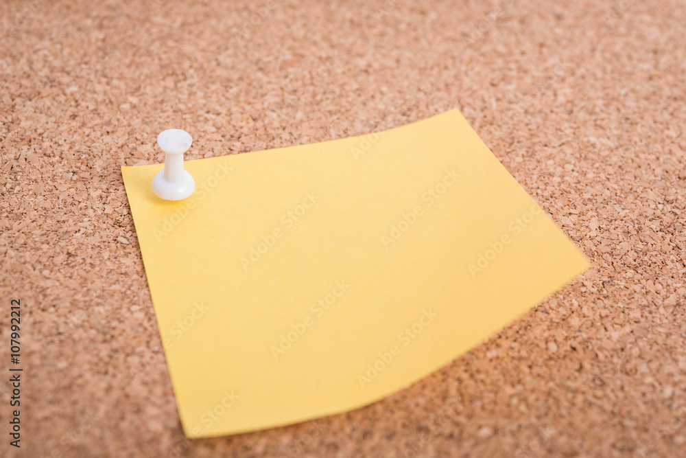 Yellow blank note papers with pin Yellow blank note papers with pin