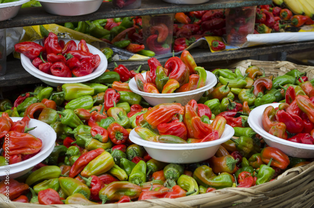 Green and red chilis in a market in Mexico Green and red chilis in a market in Mexico