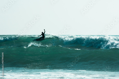 Photography Surfer Whipping Into Action at a Waves Peak