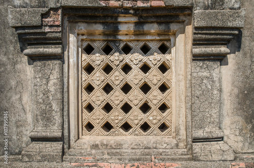 Decorative window of stucco in Ape Yadana Phaya, Bagan, Myanmar. photo