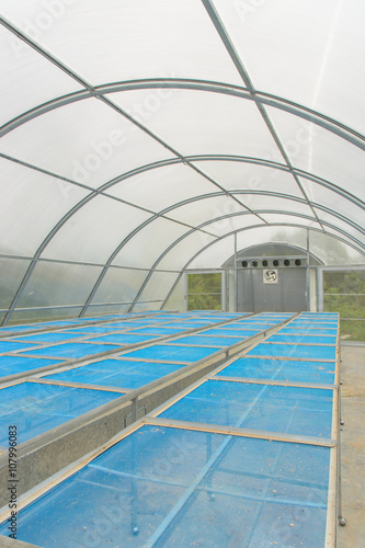 inside of solar energy plant drying greenhouse for dried product