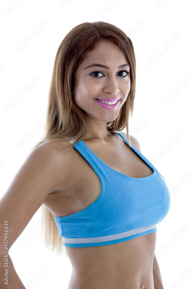 Pretty fit woman in a light blue sports bra.
Shot on a white background. Pretty fit woman in a light blue sports bra.
Shot on a white background.