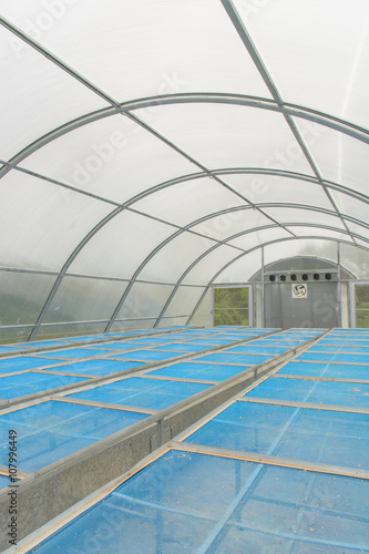 inside of solar energy plant drying greenhouse for dried product