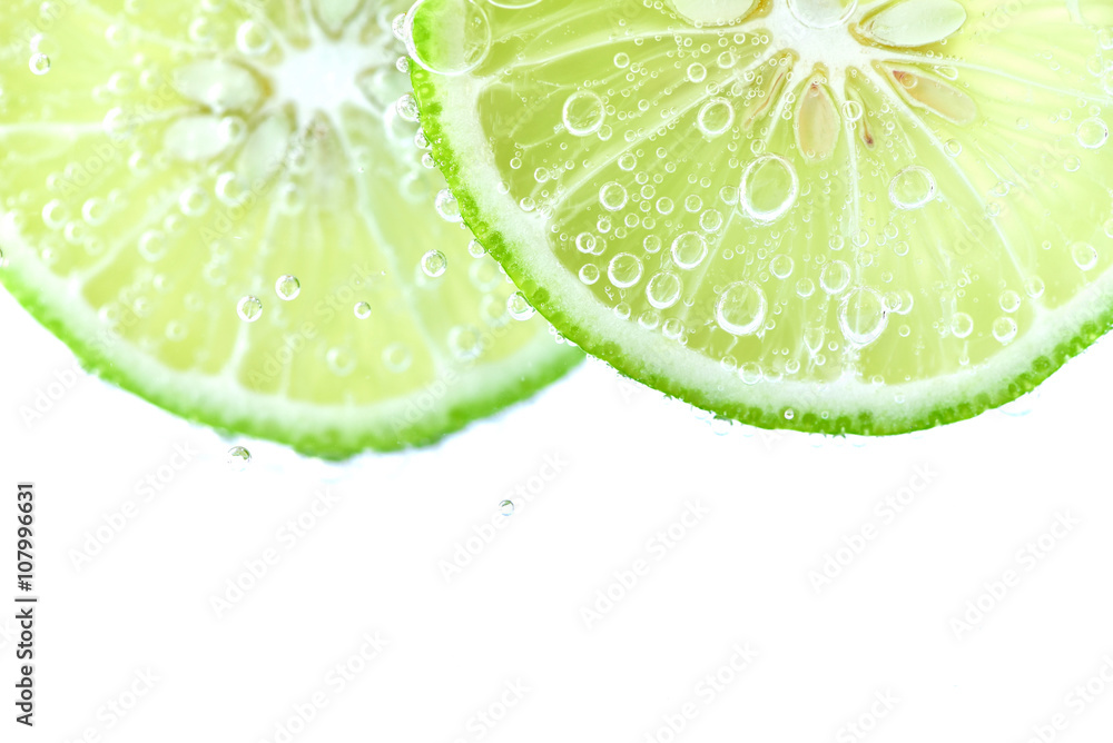 Sliced Thai lime dip in soda water Sliced Thai lime dip in soda water