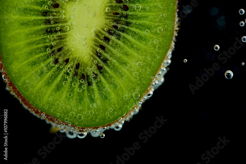 Kiwifruit dip in soda water