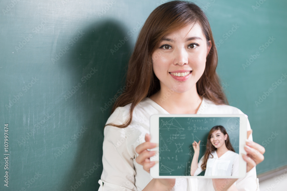 beautiful asian girl teacher with tablet and blackboard beautiful asian girl teacher with tablet and blackboard