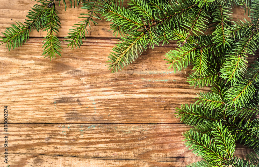 Green christmas tree on wooden boards Green christmas tree on wooden boards