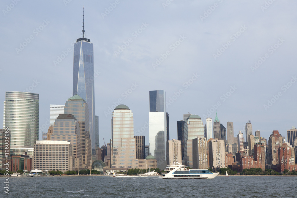 The Hudson river with Lower Manhattan in New York City in the background. The new World Trade Center Freedom Tower as seen 

