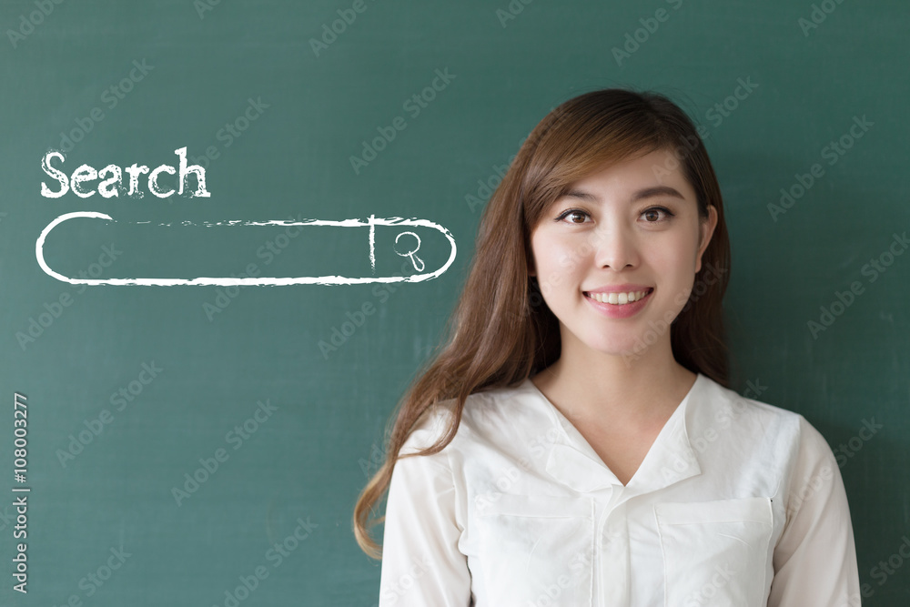 beautiful girl teacher with green blackboard
