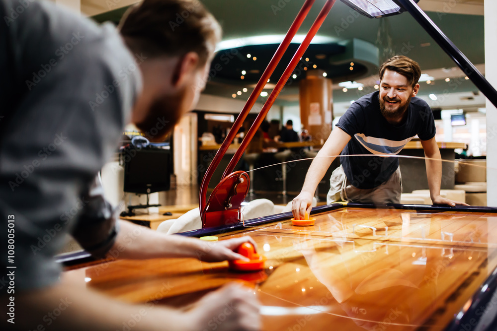 Fototapeta premium Air hockey is fun even for adults