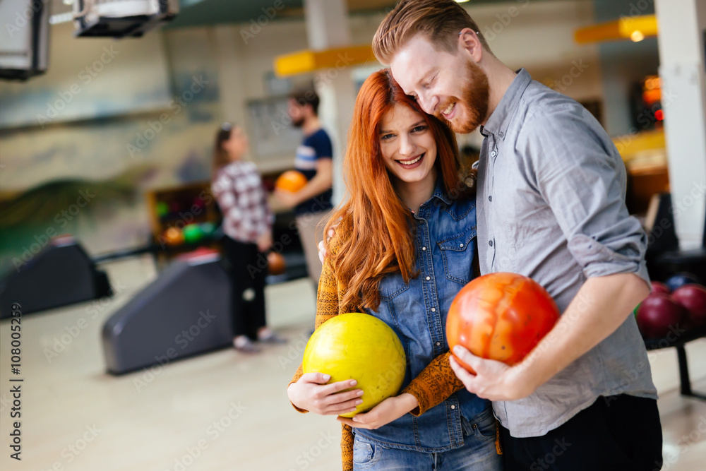 Fototapeta premium Beautiful couple dating and bowling