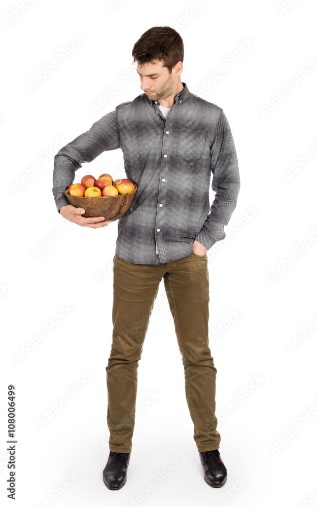 Healthy man with bowl full of apples Healthy man with bowl full of apples