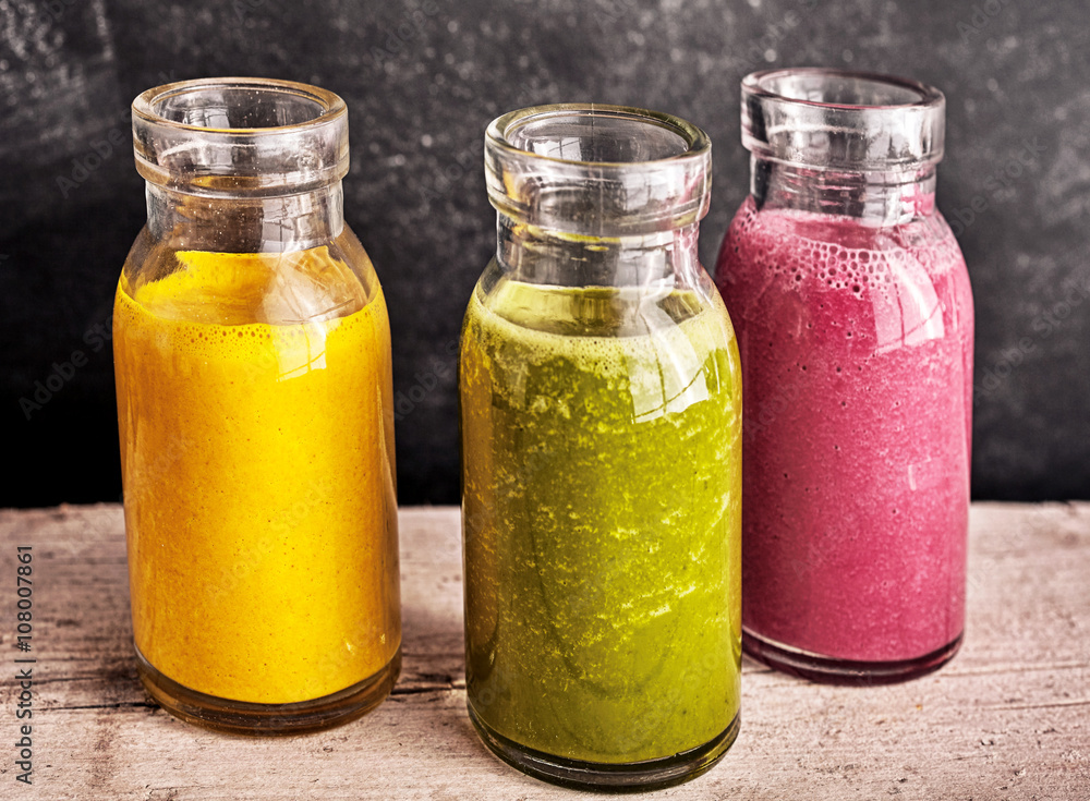 Three jars of blended fruit drinks Three jars of blended fruit drinks