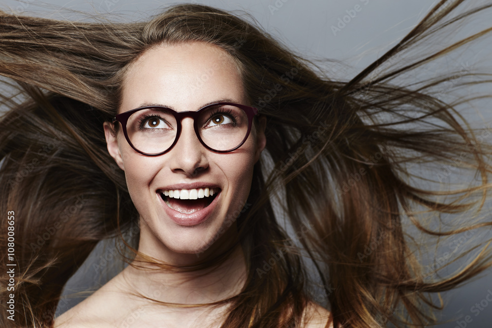 Windswept young woman wearing spectacles Windswept young woman wearing spectacles
