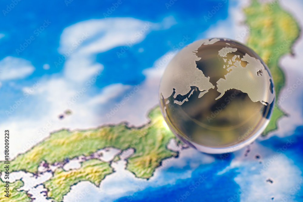 Fototapeta premium Crystal globe on map of Japan