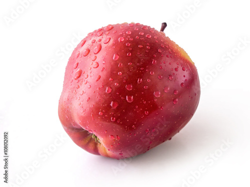 Fresh red apple covered with water drops isolated on white background