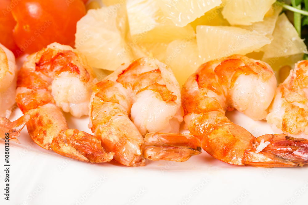 Jumbo shrimp salad with tomatoes and pomelo. Jumbo shrimp salad with tomatoes and pomelo.