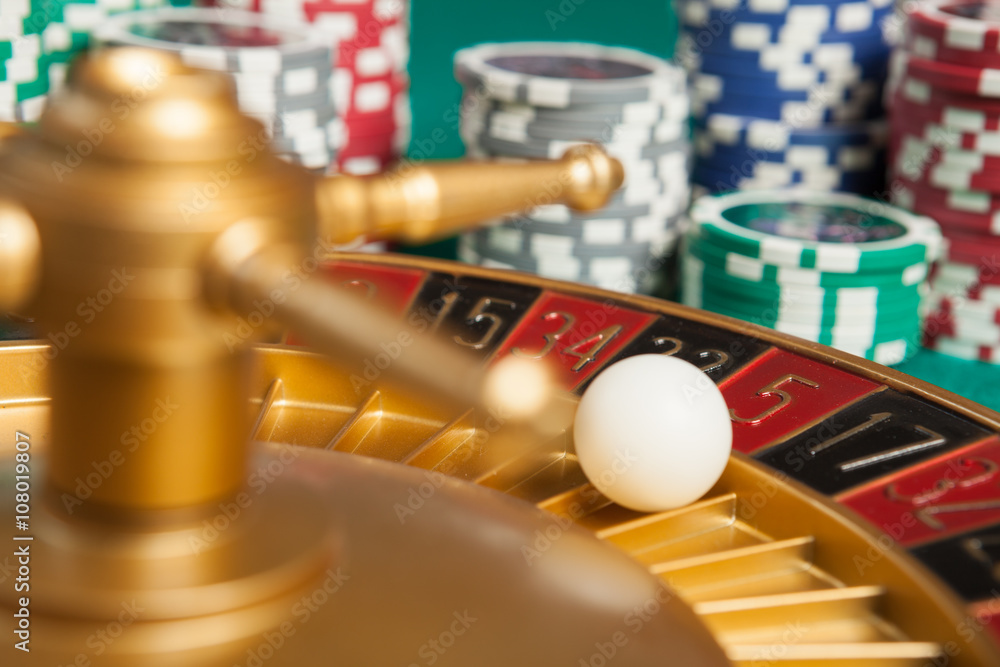 Fototapeta premium casino roulette wheel with the ball on number 5