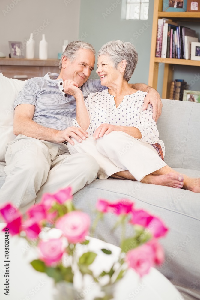 Happy romantic senior couple on sofa Happy romantic senior couple on sofa