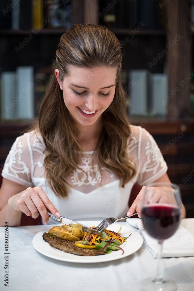 High angle view of happy woman having food