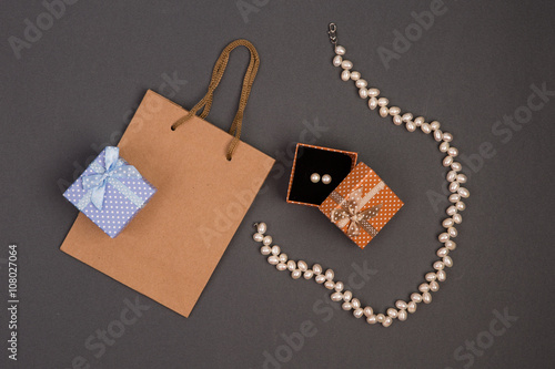 gift bag, gift boxes in polka dots with pearl jewelry 
