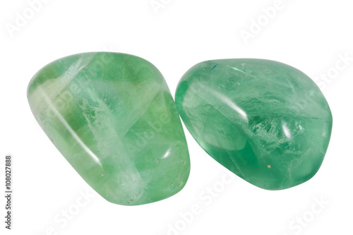 two green fluorite gems macro, isolated on white background