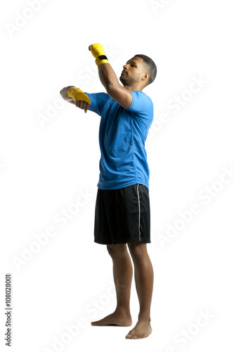 male boxer in punching training © Dan Kosmayer