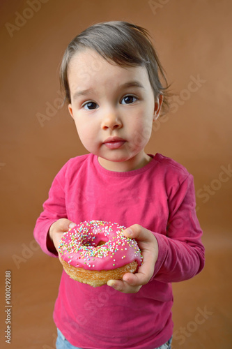 Little girl with  donut