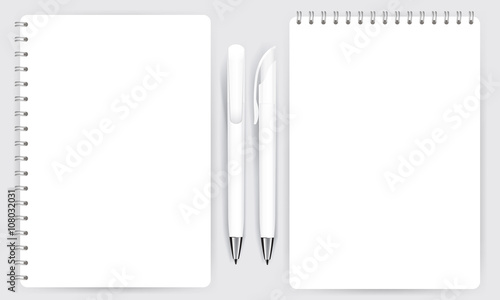 Blank realistic spiral notepad notebook and pen isolated vector