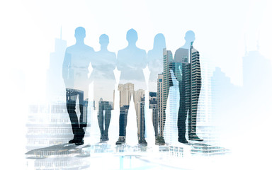 business people silhouettes over city background