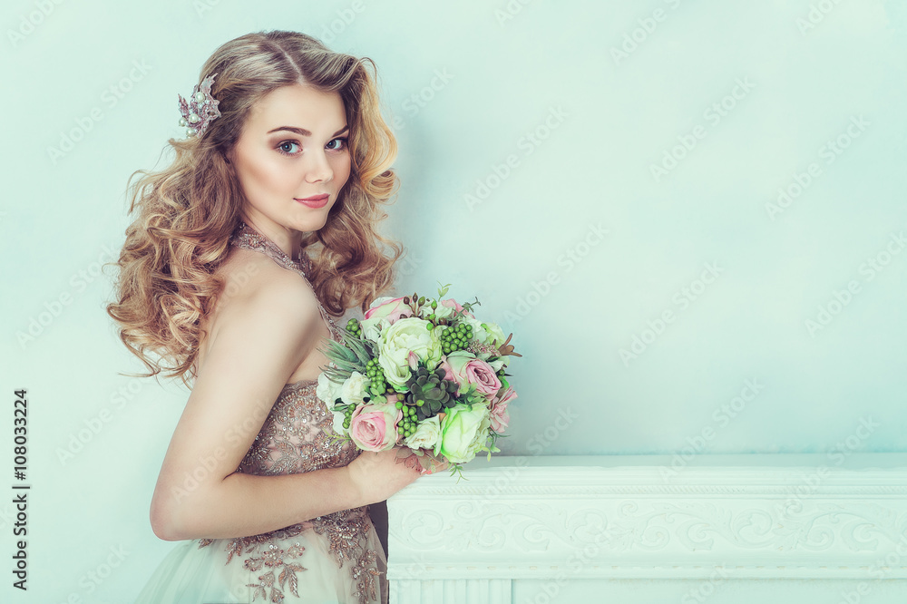 Beautiful bride in wedding dress. Portrait of young bride. Studio shot.
Beautiful bride in wedding dress. Portrait of young bride. Studio shot.
