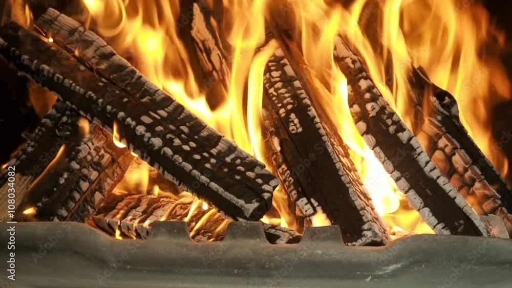 Fire in the fireplace, zoom out, close up, slow motion Fire in the fireplace, zoom out, close up, slow motion