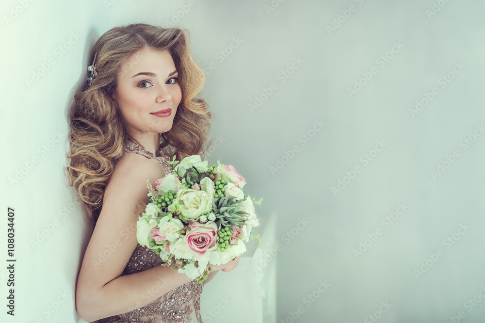 Beautiful bride in wedding dress. Portrait of young bride. Studio shot.
Beautiful bride in wedding dress. Portrait of young bride. Studio shot.