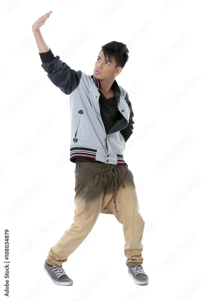 good looking male dancing on a white background good looking male dancing on a white background