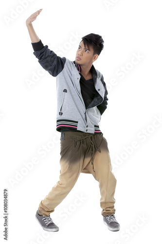 good looking male dancing on a white background