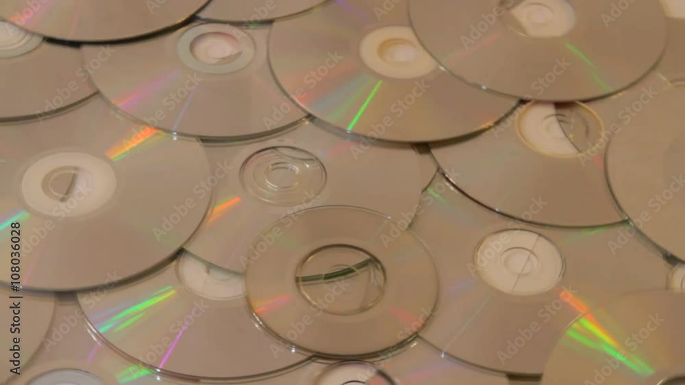 compact disc scattered on the floor compact disc scattered on the floor