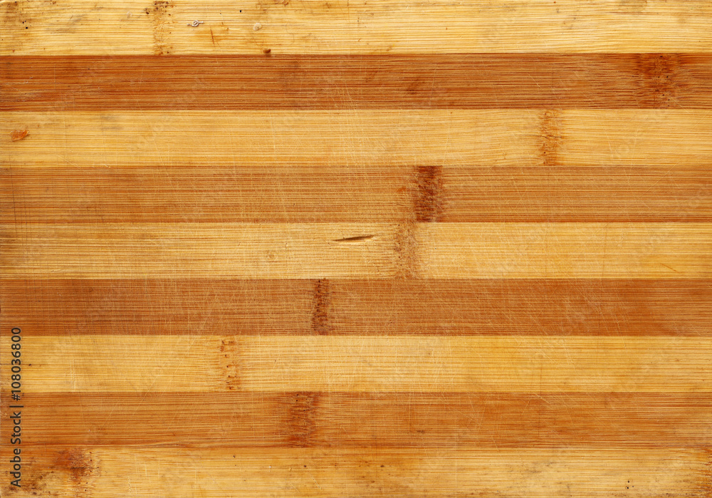Bamboo wood scratched board realistic photo texture. Warm striped background for your design. Bamboo wood scratched board realistic photo texture. Warm striped background for your design.